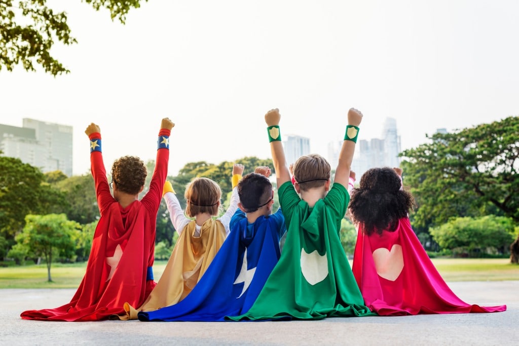 elementary-students-wearing-capes