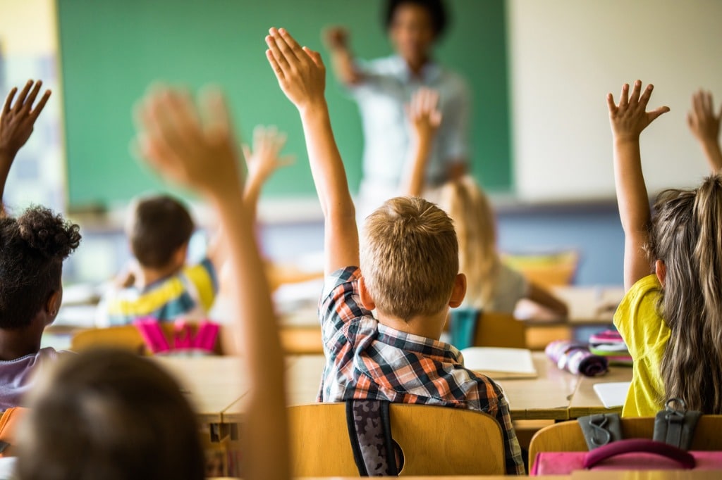 students-raising-hands