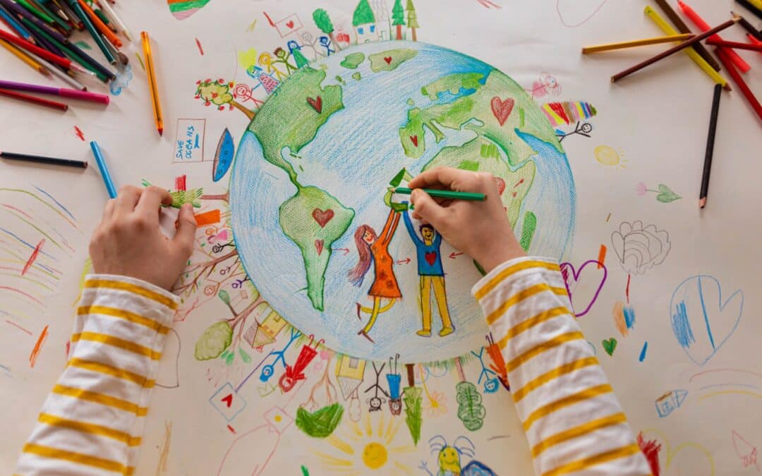 This is a photo of a 5th-grade student drawing a picture of the earth.