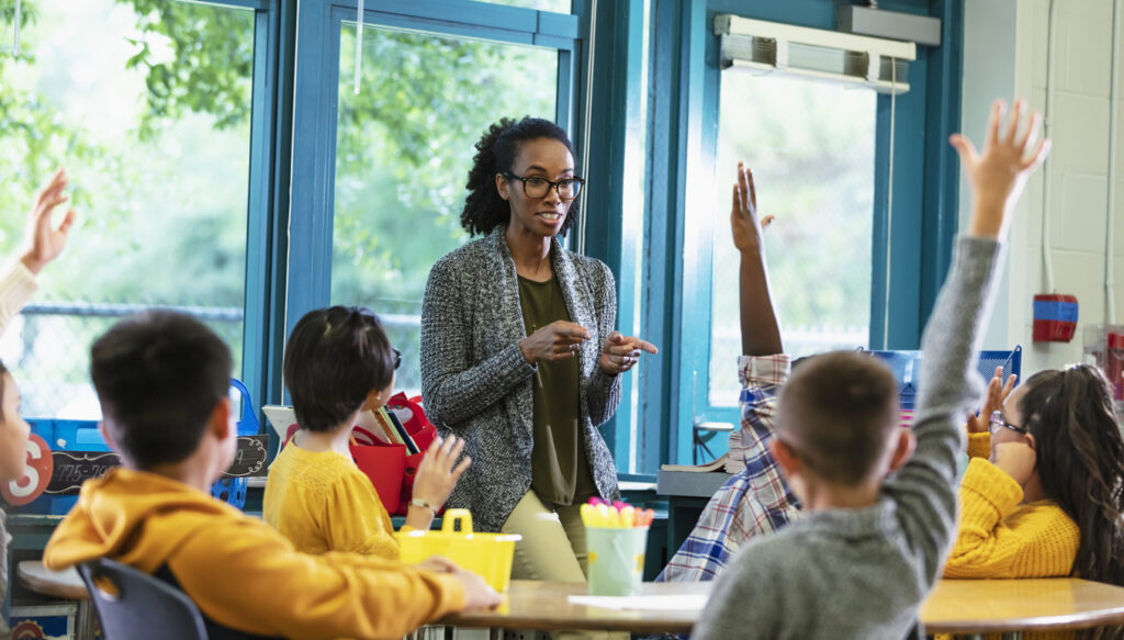 teacher-with-engaged-students-leadership-activities