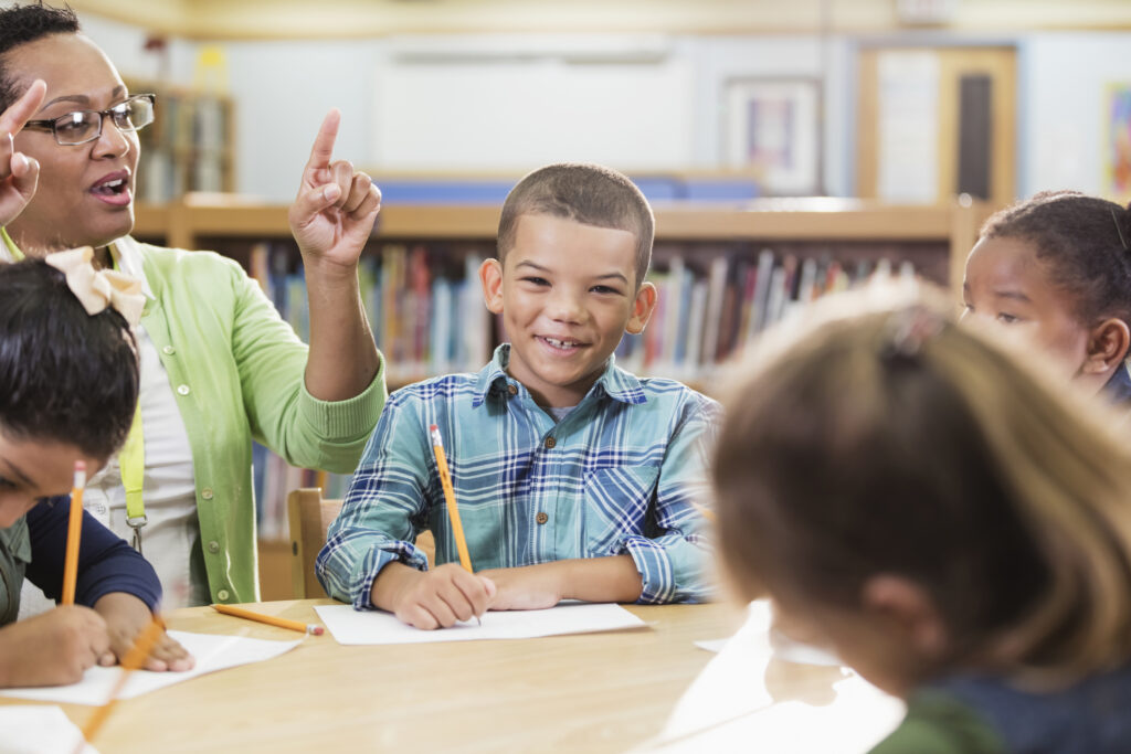 teacher-sel-lesson-at-table-with-students