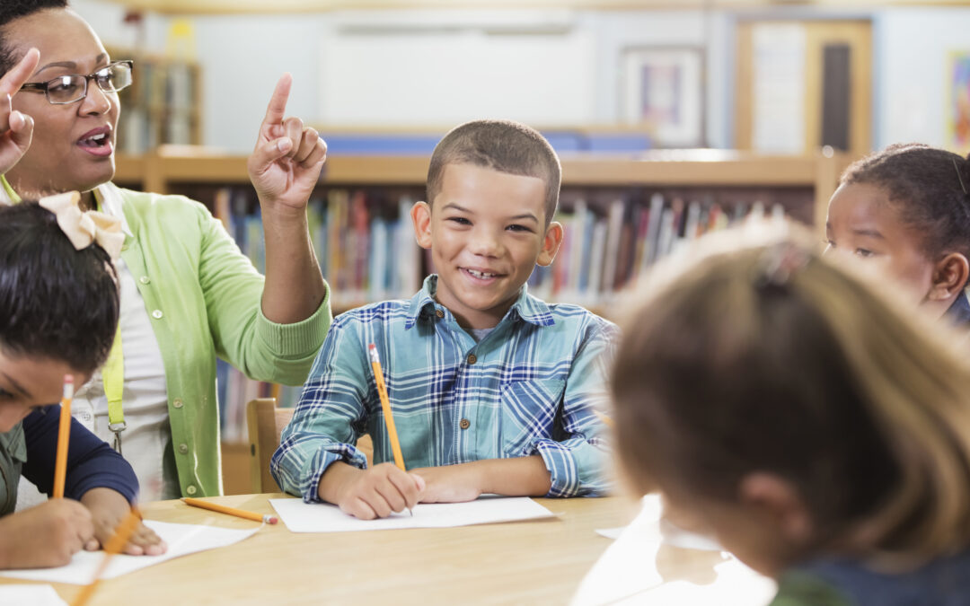 teacher-sel-lesson-at-table-with-students